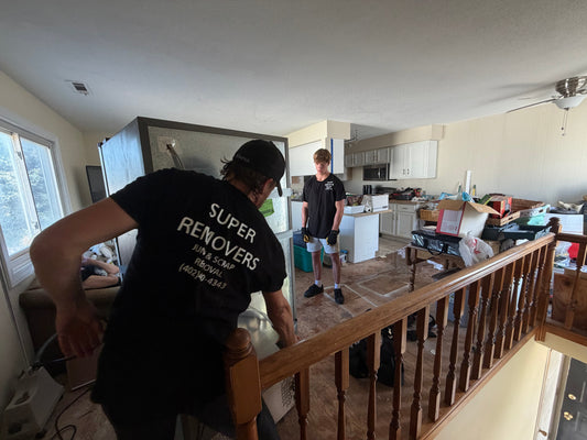 Super Removers removing a fridge from a 2nd story condominium.
